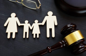 Family law concept. Figures and gavel. Divorce.